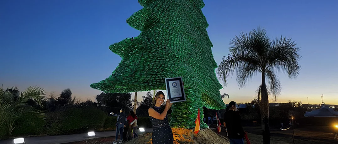 Caroline Chaptini breaks sixth Guinness Record with world’s largest plastic cedar tree