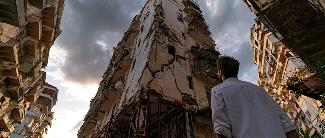 Why has Tripoli failed to address its dangerous buildings crisis?