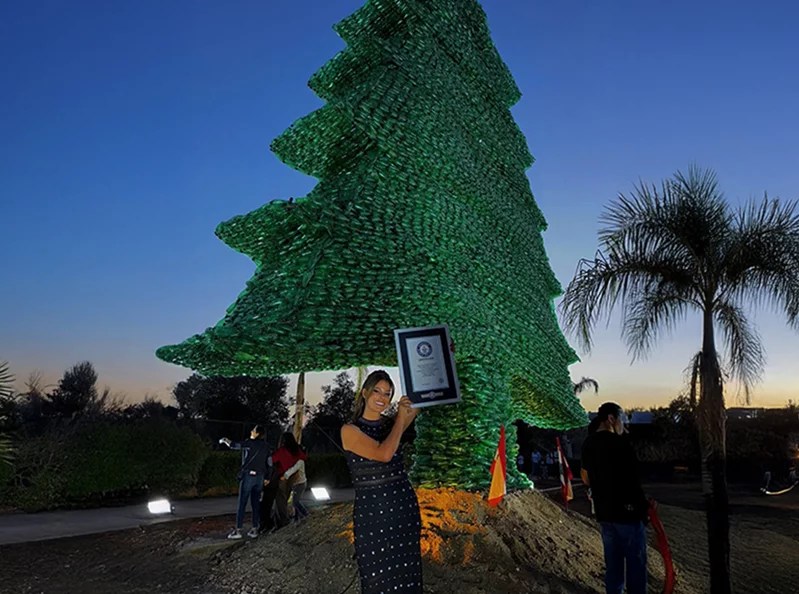 Caroline Chaptini breaks sixth Guinness Record with world’s largest plastic cedar tree